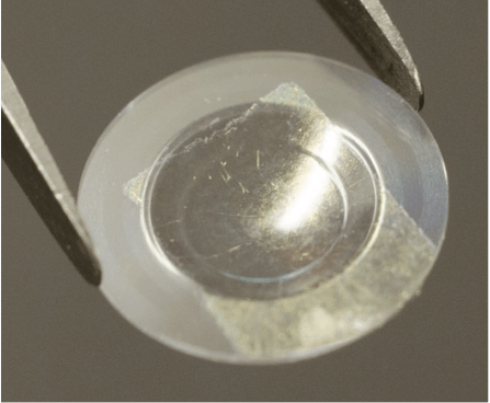 Switchable liquid crystal contact lens with graphene electrodes fabricated by the Leeds team. Copyright: Leeds University