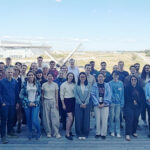 Participants and lecturers of the COMMONS/LINXS/SoftComp PhD Summer School LLPS2026 on the LINXS balcony in Lund, Sweden, August 2026, with the European Spallation Source (ESS) visible in the background. Copyright: LINXS/Mia Lindström